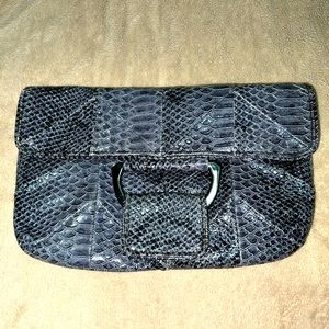 BCBGeneration faux leather snake skin clutch